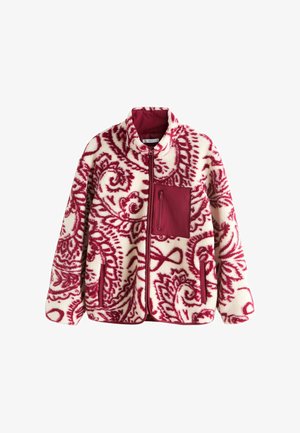 Vilkkuva fleece-takki kermanvärisenä, jossa on punainen paisley-kuvio. Takissa on vetoketjullinen rintatasku, korkea kaulus ja sivutaskut. Pehmeä pinta ja rento istuvuus.