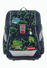 Mochila azul marino con patrones geométricos verdes, que presenta parches de dinosaurios, acentos reflectantes y cremalleras plateadas. Incluye correas ajustables.