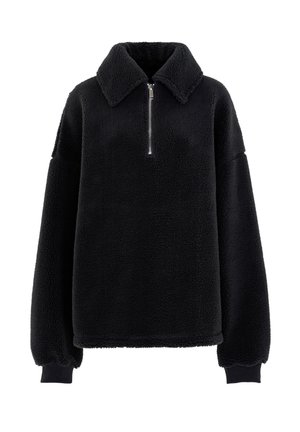 Pullover in pile nero con zip al collo, colletto e maniche oversize. La texture morbida e il colore uniforme esaltano il suo design casual.