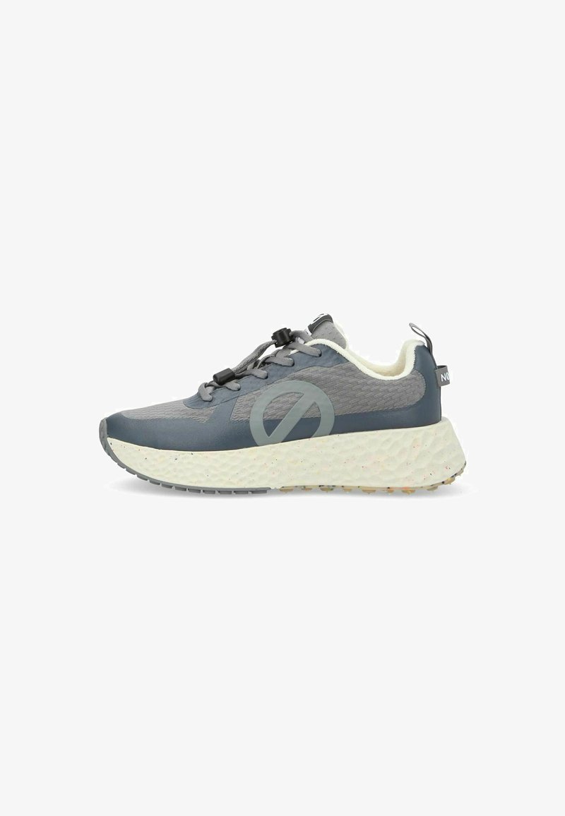 Gray athletic shoe featuring a textured upper, padded collar, lace-free design, and a thick, speckled white midsole with grip pattern.