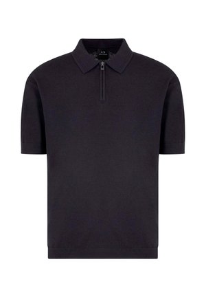 Polo in blu navy scuro, con colletto a zip, maniche corte e orlo a coste. Realizzato in tessuto liscio con un design pulito e minimal.