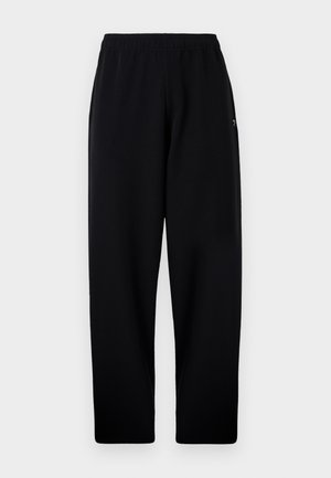 Mustat collegehousut, joissa on joustava vyötärö, suorat lahkeet ja pieni logo vasemmalla puolella. Pehmeä materiaali ja yksinkertainen rakenne.