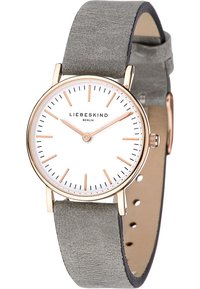 Ronde dameshorloge met een witte wijzerplaat, rosegouden accenten en een grijze lederen band. Beschikt over uurmarkeringen en een minimalistisch ontwerp.