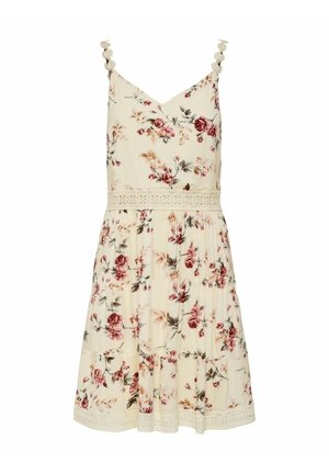 Robe florale à bretelles spaghetti, avec un fond crème clair, imprimé floral rose et vert, dentelle aux hanches et jupe plissée.