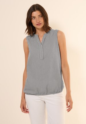 Blouse sans manches rayée bleu marine et blanche, avec un décolleté en V et un ourlet élastiqué pour un ajustement décontracté. Tissu en coton doux.