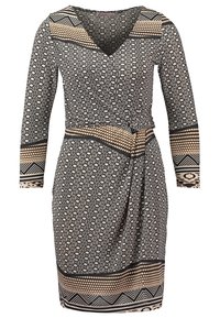 Black and beige long-sleeve wrap dress featuring geometric patterns, a V-neck, and a gathered waist with an asymmetrical hemline.