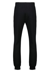 Svarta bomullsbyxor med elastisk midja, smalnande ben och en enda bakficka. Slät textur med ribbade mudd vid anklarna.