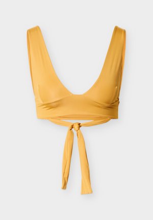 Bikiinide ülaosa - turmeric