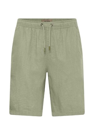 Hellgrüne, knielange Shorts mit elastischem Bund und verstellbarem Kordelzug, hergestellt aus einem leichten Stoff.