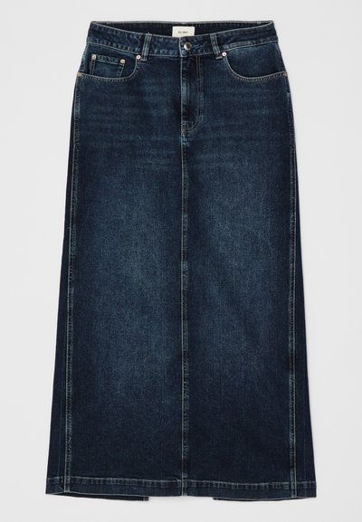 Temno modra krila z ravno obliko in dolžino do kolen. Ima sprednja žepa, zadrgo in subtilne detajle šivanja vzdolž šivov.