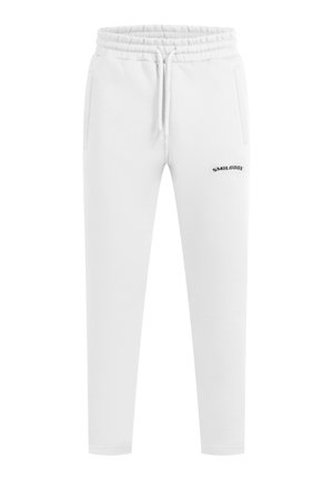 Hvide sweatpants med elastisk talje og snoretræk, der har sidelommer og et sort "SMILODON" logo på venstre ben.