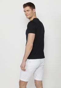 Koroshi SHORT SLEEVE - Apdrukāts T-krekls - black