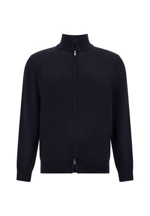 Marineblauer Reißverschluss-Pullover mit hohem Kragen, langen Ärmeln, gerippten Bündchen und Saum; aus glattem, weichem Stoff, mit einem dezenten Reißverschluss.