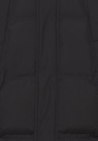 Black puffer jacket featuring a quilted design, smooth texture, two front pockets, and a full-length zipper.