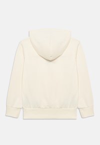 Φούτερ με κουκούλα σε κρεμ χρώμα με μακριά μανίκια, υφή υφάσματος και ριμπ τελείωμα. Πίσω μέρος απλό χωρίς επιπλέον σχέδια ή διακοσμήσεις.