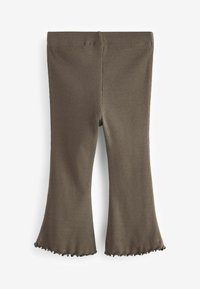 Pantaloni a zampa d'elefante marroni a coste con una finitura texture e un orlo ondulato. Progettati con una vita elasticizzata per il massimo comfort.