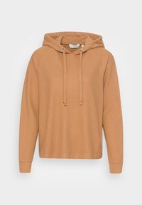 Kapturowa bluza w jasnobrązowym kolorze, wykonana z miękkiego materiału. Posiada ściągacze na rękawach, luźny krój oraz sznurki do regulacji kaptura.
