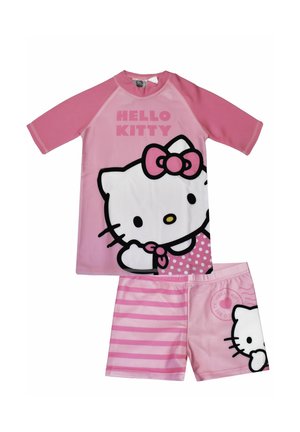 Pink Hello Kitty short-sleeve top with matching pink shorts, featuring Hello Kitty character and polka dot and striped patterns.