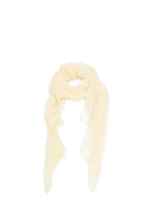 Sciarpa leggera di colore crema chiaro trasparente, annodata in modo sciolto con lunghe estremità fluenti su uno sfondo bianco semplice.