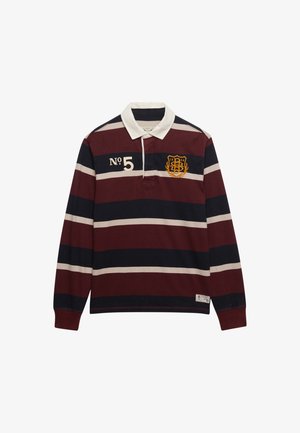 Koszulka rugby z długim rękawem w poziome paski w kolorach bordowym, granatowym i beżowym, z białym kołnierzykiem, napisem "No 5" oraz złotym haftowanym herbem na piersi.