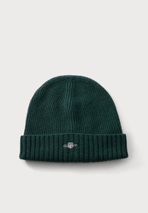 Bonnet tricoté côtelé vert foncé avec un revers plié et un petit logo brodé au centre devant.