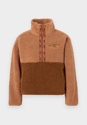 Brown fleece pullover with a high collar, featuring a zip closure and multicolored patterned trim. Embroidered logo on chest.