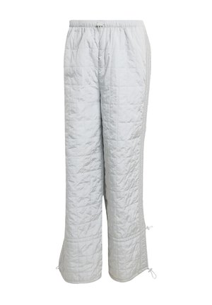 Pantaloni trapuntati grigi chiari con vita elasticizzata, fessure laterali e cordoncini regolabili all'orlo. Finitura liscia e strutturata.