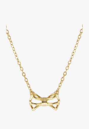 Złoty łańcuszek z pustym, kokardkowym wisiorkiem o polerowanym, ażurowym wzorze.