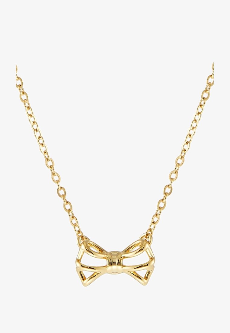 Collier chaîne en or avec un pendentif creux en forme de nœud, présentant un design poli et ajouré.