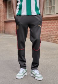 Puma AC MILAN CASUALS PANTS - Klub merchandise - black/for all time red