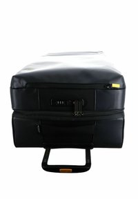 Valise noire au design épuré, dotée d'une serrure combinée, de deux zippers et d'une poignée rétractable. Texture lisse et construction robuste.