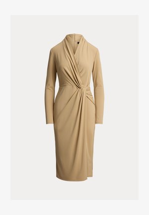 Μπεζ midi φόρεμα με μακριά μανίκια, με πλισαρισμένη, στριφογυριστή λεπτομέρεια στο μπροστινό μέρος και κρυφό φερμουάρ στο πίσω μέρος.