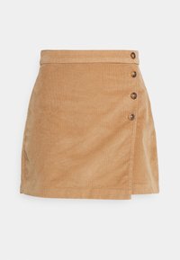 Sametová sukně, tan barvy, délky nad kolena, se bočním zapínáním na knoflíky, čtyřmi dekoračními knoflíky a mírně A-liniovým střihem.