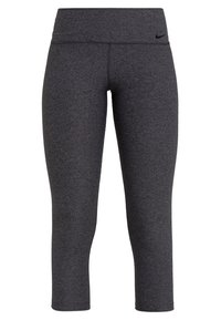 Nike capri leggings vaaleanharmaana, valmistettu sileästä, joustavasta kankaasta. Varustettu korkealla vyötäröllä ja pienellä mustalla logolla vasemmalla puolella.
