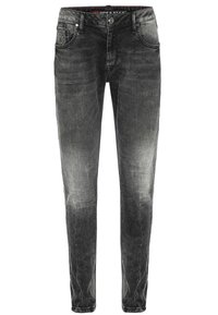 Zwarte spijkerbroeken van denim, slim fit, vervaagd met lichtere gebieden, vijf zakken, knoop- en ritssluiting, subtiele stikdetails.