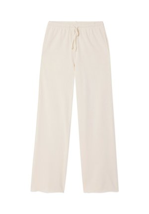 Light beige, loose-fitting, wide-leg pants with an elastic waistband and adjustable drawstring, made from a soft fabric texture.