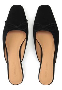 Black suede slip-on shoes with a square toe and a decorative bow detail. Beige insole with embossed “Kazar Studio” logo.