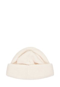 Cream beanie hat made of soft, textured fabric, featuring a rolled cuff and a rounded top for warmth and comfort.