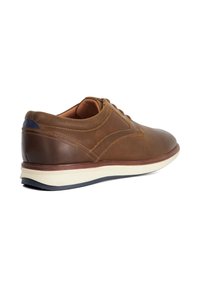 Brown leather men's casual lace-up shoe with white sole and dark blue heel detail, shown from a side rear angle.