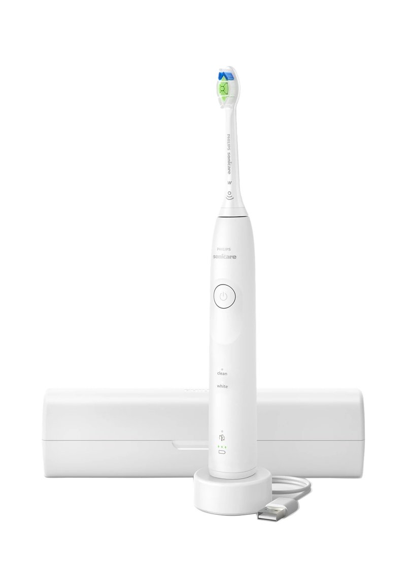 Brosse à dents électrique sonique blanche avec une tête de brosse bleu et vert, station de chargement et étui de voyage blanc. Câble USB inclus.