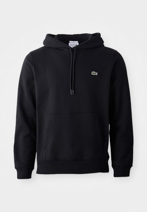 Felpa nera in misto cotone con tasca a marsupio, cappuccio con cordino e un piccolo logo di coccodrillo verde sul lato sinistro del petto.