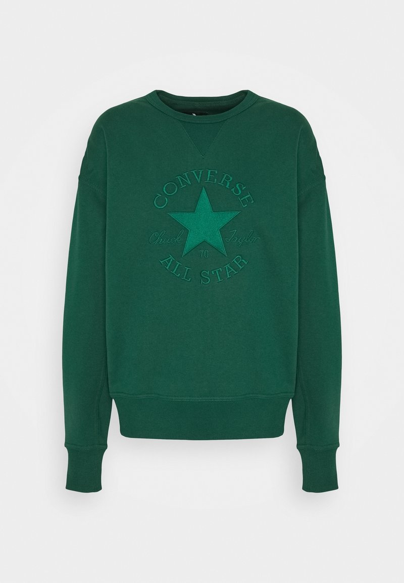 Felpa verde realizzata in morbido tessuto con un design a stella in rilievo e il testo "Converse Chuck Taylor All Star". Collo a giro e polsini a coste.
