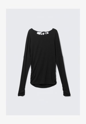 Black long-sleeve top with ruched sides and a tied open back neckline, displayed against a plain light background.
