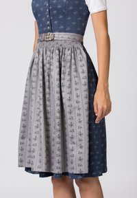 Dirndl dress with a fitted blue bodice, white sleeves, and a gray skirt featuring floral patterns. Includes a decorative belt buckle.