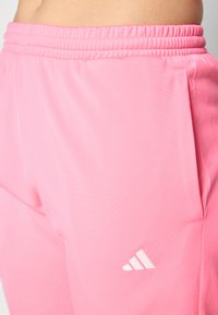 adidas Sportswear FEELCOZY - Tepláková súprava - lucid pink