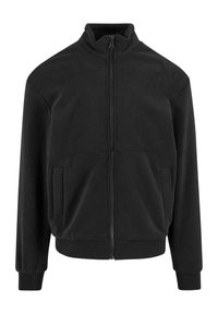 Svart fleecejacka med hög krage, full dragkedja, två framfickor, ribbade ärmmuddar och nederkant. Slät textur och minimalistisk design.