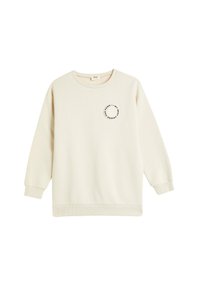 Sudadera de color crema hecha de una tela suave, con un diseño gráfico redondo en el pecho. Manga larga con puños y dobladillo acanalados.