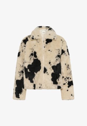Veste en fausse fourrure avec un motif vache crème et noir, fermeture éclair à l'avant, finition douce et texturée avec un col classique.
