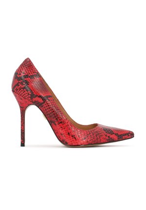Red high-heeled pump with a pointed toe, made of textured snakeskin material, featuring a sleek silhouette and a thin stiletto heel.