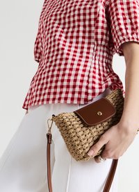 Calliope PICCOLA - Cross body bag - beige